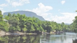 The Kurupung River with the Roraima escarpment in the background. U3O8 Corp.'s Aricheng North and Aricheng South uranium projects are both located in the Roraima basin of Guyana.