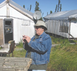 Former Noront Resources CEO Richard Nemis examines core from the high-grade Eagle One project at McFaulds Lake in far northern Ontario.