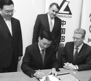 At Rio Tinto's annual meeting, where a major strategic partnership between Rio Tinto and Chinalco was announced, from left: Luo Jian Chuan, vice president of Chinalco; Xiao Yaqing, president of Chinalco; Paul Skinner, outgoing chairman of Rio Tinto; and Tom Albanese, CEO of Rio Tinto.