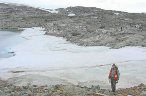 Geologist Sonya Neilson prospects at Peregrine Diamond's Chidliak diamond property on Baffin Island, in Nunavut. A survey conducted by Natural Resources Canada that polled 795 mining and exploration companies projects they will spend half as much on exploration in Canada in 2009 as they did in 2008.