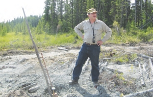 Grald Riverin, president and CEO of Cogitore Resources, poses by hole 34 at the company's Scott Lake VMS project, 20 km west of Chibougamau, Que.