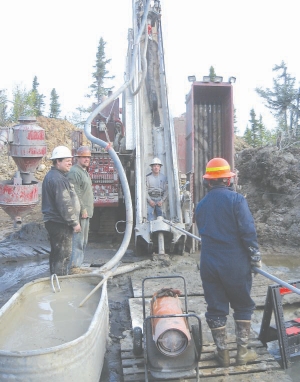 Conducting a gyroscopic survey of a reverse-circulation hole at International Tower Hill Mines' Livengood gold discovery, in Alaska.