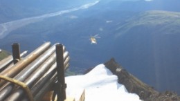 A helicopter descends from a drilling platform at Constantine Metal's Palmer polymetallic project in southeastern Alaska. The project is one of North America's newest volcanogenic massive sulphide discoveries.