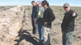 Argentex Mining president and CEO Ken Hicks (right) and chief geological consultant Diego Guido (second from right) examine trenching efforts with site visitors at the company's Pinguino silver-gold-lead-indium project in Santa Cruz province, Argentina.