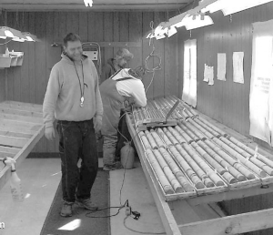 Inspecting core samples at Brett Resources' Hammond Reef gold project near Thunder Bay, Ont.