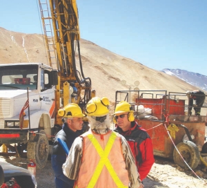 From left: Malbex Resources director David Garofalo, CEO Tim Warman and VP of exploration Peter Stewart in front of a drill rig at the company's Del Carmen gold-silver-copper project in Argentina.