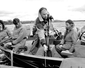 STEWART HAMILTON (CENTRE) DEMONSTRATES SEDIMENT SAMPLING TO EARTH SCIENCES STUDENTS ON RAMSAY LAKE IN SUDBURY, ONT., DURING THE 4TH ANNUAL STUDENT-INDUSTRY MINERAL EXPLORATION WORKSHOP. TWENTY SIX OF THE TOP EARTH SCIENCES STUDENTS FROM ACROSS CANADA GATHERED IN SUDBURY FROM MAY 8 TO 22 FOR A TWO-WEEK WORKSHOP ON MINERAL EXPLORATION AND MINING. THE EVENT WAS SUPPORTED BY THE PROSPECTORS AND DEVELOPERS ASSOCIATION OF CANADA.