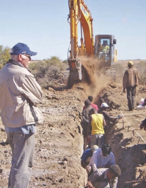 Energizer Resources personnel logging vanadium samples during a trenching program at the Green Giant vanadium project in Madagascar.