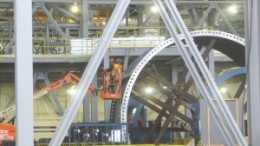 Workers inspect the mill facilitiy at Osisko Mining's Canadian Malartic gold project in Malartic, Quebec.