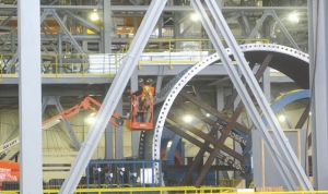 Workers inspect the mill facilitiy at Osisko Mining's Canadian Malartic gold project in Malartic, Quebec.