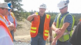 Trelawney Mining and Exploration's president and CEO Greg Gibson (centre) and colleagues at the Chester gold project.
