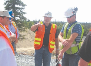 Trelawney Mining and Exploration's president and CEO Greg Gibson (centre) and colleagues at the Chester gold project.