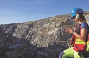 A geologist stands above Gold-Ore's Bjorkdal open-pit gold mine near Skelleftea in northern Sweden.