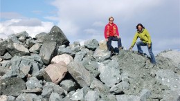 Shear Minerals president and CEO Pamela strand and executive chairman Julie Lassonde stand on a stockpile of unprocessed kimberlite at Jericho, in Nunavut. Credit: Shear Minerals.