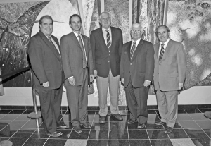 At the Willet Green Miller Centre in Sudbury, from left: Dominic Giroux, Centre for Excellence in Mining Innovation (CEMI) board member and president of Laurentian University; Fred Delabbio, Rio Tinto's general manager of underground mining innovation and CEMI board member; Peter Kaiser, CEMI president and CEO; Rick Bartolucci member of provincial parliament for Sudbury; and John Rodriguez, mayor of Sudbury.