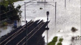 Flooded train tracks in Gailes, Queensland, Australia, just outside of Brisbane. Photo by By Martin Howard