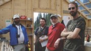 Head of mineral services for the Yukon Geological Survey, Mike Burke (far left), and Atac Resources' president Rob Carne (second from right), with members of the exploration team in the core shack at the Rau gold project.