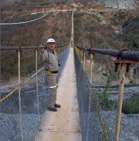 Marco Navarro, safety and ecology superintendent, on the suspension bridge at Primero Mining's San Dimas gold-silver mine in Mexico. Photo by Primero Mining.