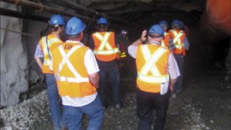 Visitors enter the mine workings at Trelawney Mining and Exploration's Chester gold project in August. Photo by Salma Tarikh