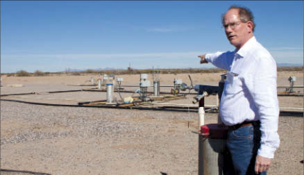 Curis Resources' vice-president of project development Mel Lawson points to the Florence in-situ leaching copper project, 100 km southeast of Phoenix, Ariz. Photo by Ian Bickis