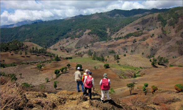 GoldQuest Mining's geologists looking southwest across the La Escandalosa gold-copper project, in the Dominican Republic's San Juan province. Photo by GoldQuest Mining