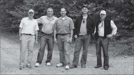 Pele Mountain Resources' president and CEO Alan Shefsky (centre) with directors in Elliot Lake, Ont. Photo by Pele Mountain Resources