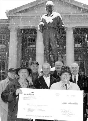 Faculty and administrators in front of the Mackay Statue at the University of Nevada, Reno, with a US$250,000 check from Newmont Mining. Photo by University of Nevada, Reno