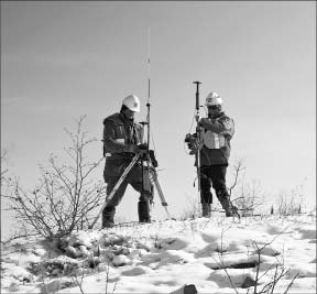 Workers on an outcrop at Royal Nickel's Dumont nickel project, about 25 km northwest of Amos in Quebec's  Abitibi region. Photo by Royal Nickel