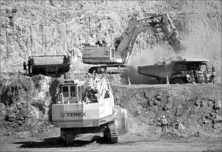 Workers and machinery in action at Nevsun Resources Bisha polymetallic mine in Eritrea. Photo by Nevsun Resources