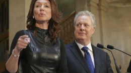 Nathalie Normandeau and Quebec Premier Jean Charest at her resignation press conference.