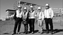 At the Copper Cliff site in Sudbury, Ont., with the Rail-Veyor in the background, from left: Mike Romaniuk, president and CEO of Rail-Veyor Technologies; Marianne Matichuk, Mayor of the City of Greater Sudbury; Jon Treen, general manager of Vale's Ontario operations; Alex Henderson, general manager of mines and mill technology for Vale's North Atlantic Region; and Peter Golde, principal engineer, research and development for Vale.