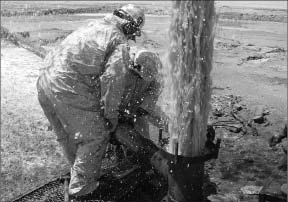 Workers cap a drill hole that encountered artesian conditions at Rodinia Lithium's Salar de Diablillos project in Salta province, Argentina. Photo by Rodinia Lithium