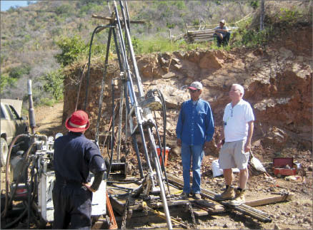 First Mexican Gold CEO Jim Voisin (far right) and geologist Toms Tapia Figueroa observing a driller at work at the Guadalupe gold project in Mexico. Photo by Salma Tarikh