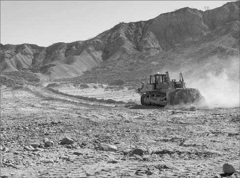 A bulldozer operator at Baja Mining's Boleo copper-cobalt-zinc-manganese project in Mexico. Photo by Baja Mining