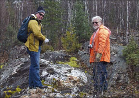 Hudson River Minerals President and CEO Stephen Balch (left) and prospector Clifford Hicks trace quartz veins with a GPS for a distance of 450 metres at the Forge Lake gold project near Wawa, Ontario. The veins remain open along strike. Photo by Hudson River Minerals