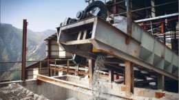 A conveyor moves material at Malaga's Pasto Bueno tungsten mine in Peru. Photo by Grard Tournebize