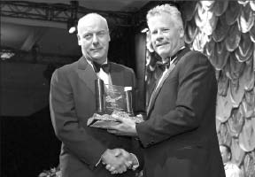 Detour Gold's Gerald Panneton (left) accepts the Bill Dennis award from PDAC president Scott Jobin-Bevans. Photo by EnvisionDigitalPhoto.com