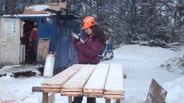 Geologist Tanushree Bose inspects core at Victory Gold Mines' Gold Pike gold project near Timmins, Ontario. Photo by Victory Gold Mines