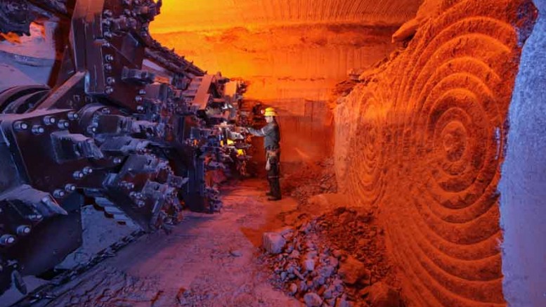 A worker inspects machinery underground at Potash Corp. of Saskatchewan's Lanigan potash mine in Saskatchewan. Photo by Potash Corp. of Saskatchewan