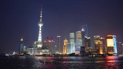 China's demand for mineral resources affects mining and exploration worldwide. Pictured above: Shanghai's skyline. Photo by Josephine Lim