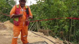 Geologist Waisale Kuruisaravi with core samples at Lion One Metals' Tuvatu gold project in Fiji. Photo by Lion One Metals