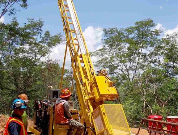 Drillers at Unigold's Candelones target at its Neita gold project in the Dominican Republic. Photo by Unigold