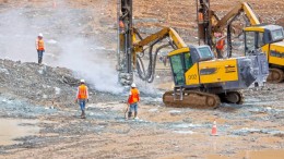 Workers drilling in the pit at Petaquilla Minerals' Molejon gold mine in Panama, 130 km west of Panama City. Photo by Petaquilla Minerals