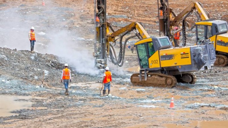 Workers drilling in the pit at Petaquilla Minerals' Molejon gold mine in Panama, 130 km west of Panama City. Photo by Petaquilla Minerals