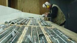 Geologist Alain-Jean Beauregard examines core from Integra Gold's Lamaque gold project in Val-d'Or, Quebec. Photo by Integra Gold