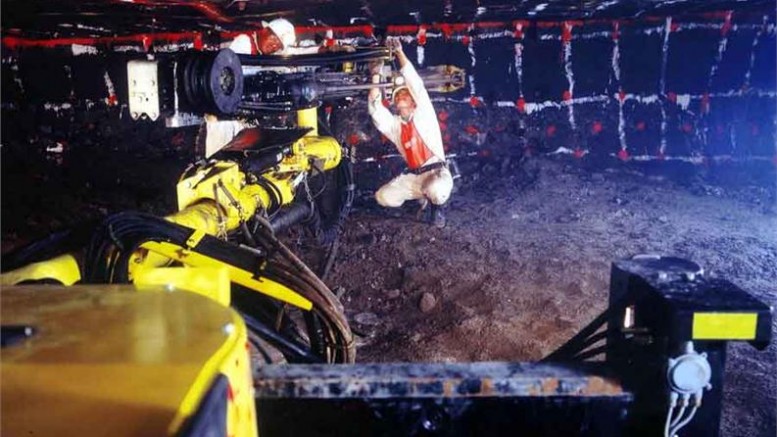 Workers prepare to drill blast holes in Anglo American's Rustenburg platinum mine in South Africa. Photo by Anglo American