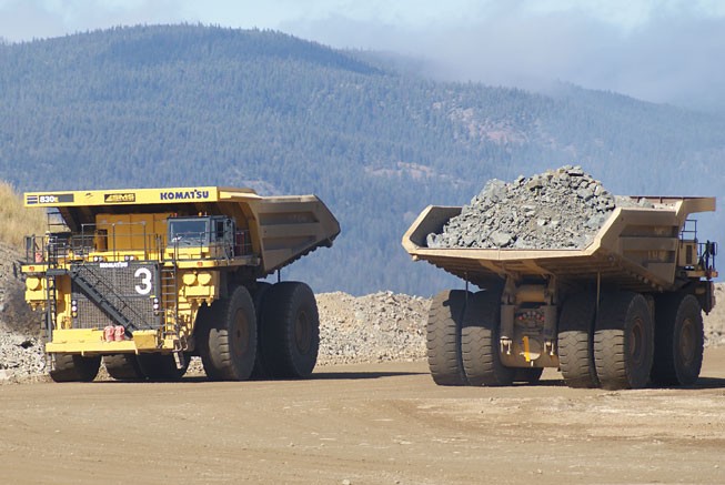 Trucks hauling ore at Copper Mountain's namesake mine. Source: Copper Mountain Mining