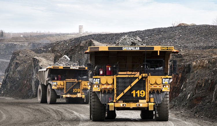 CAT 793F mining trucks at Osisko's Malartic mine. Photo by Daniel Rompr