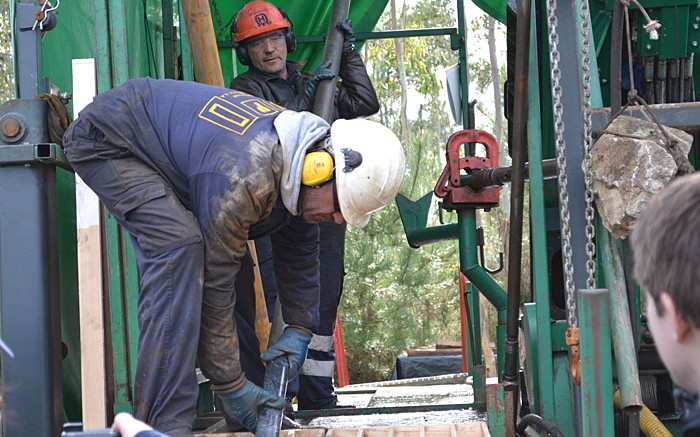 Drillers at work at Edgewater Exploration's Corcoesto gold project in northwestern Spain. Photo by Matthew Keevil