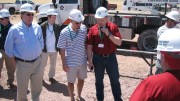 Passport Potash CEO Joshua Bleak (centre) with colleagues at Holbrook. Photo by John Cumming.